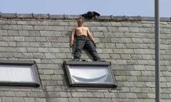 Burglar trapped on roof